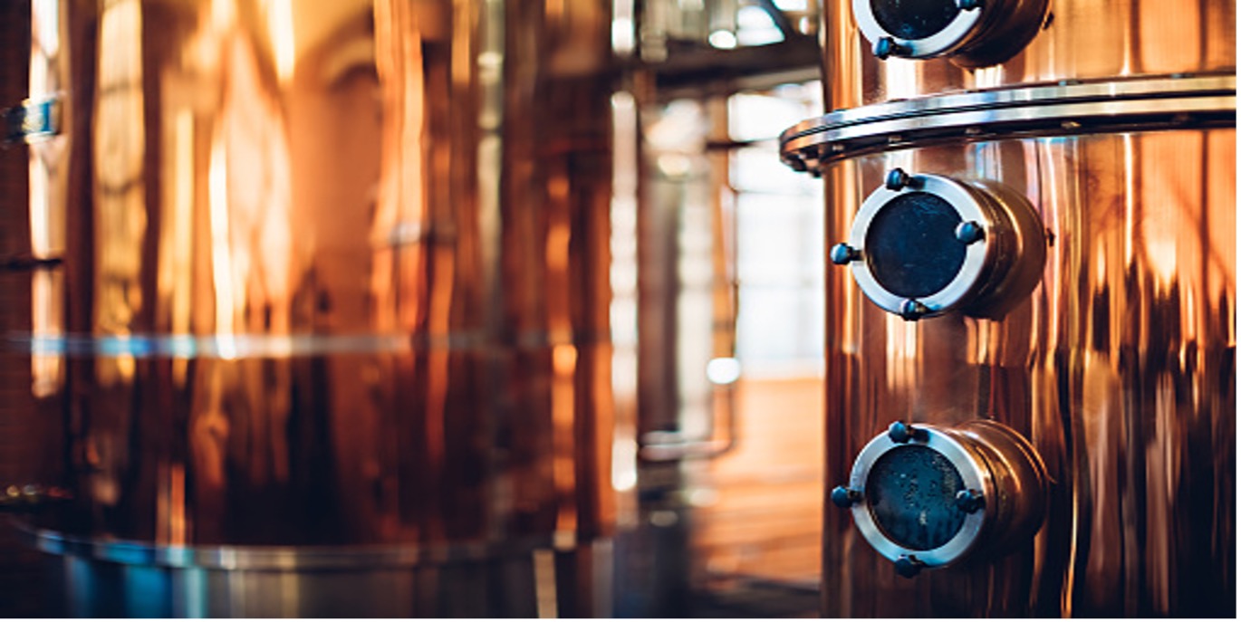 Closeup of stainless steel distilling tanks