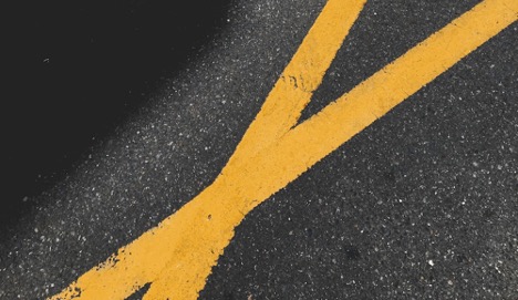 Highway-road-paint Intersecting lines of yellow road paint